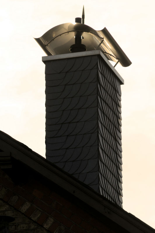 keep-autumns-leaves-of-out-of-your-chimney-with-a-new-chimney-cap-image-albany-ny-northeastern-masonry-chimney
