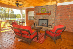 screened in patio with gas log fireplace
