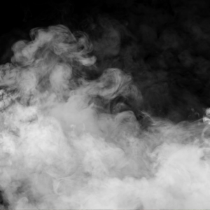gray smoke rising against a black background