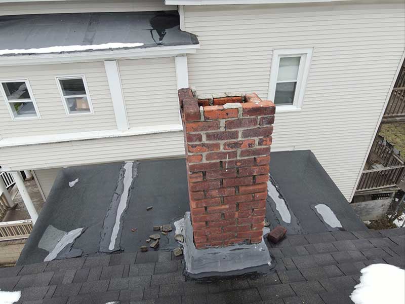 Chimney Rebuild from Roofline Before