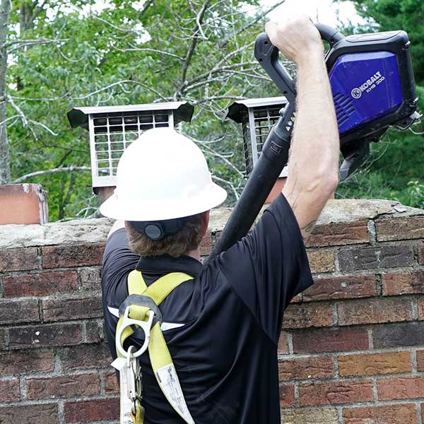 Northeastern-Chimney-Technician-working-on-chimney
